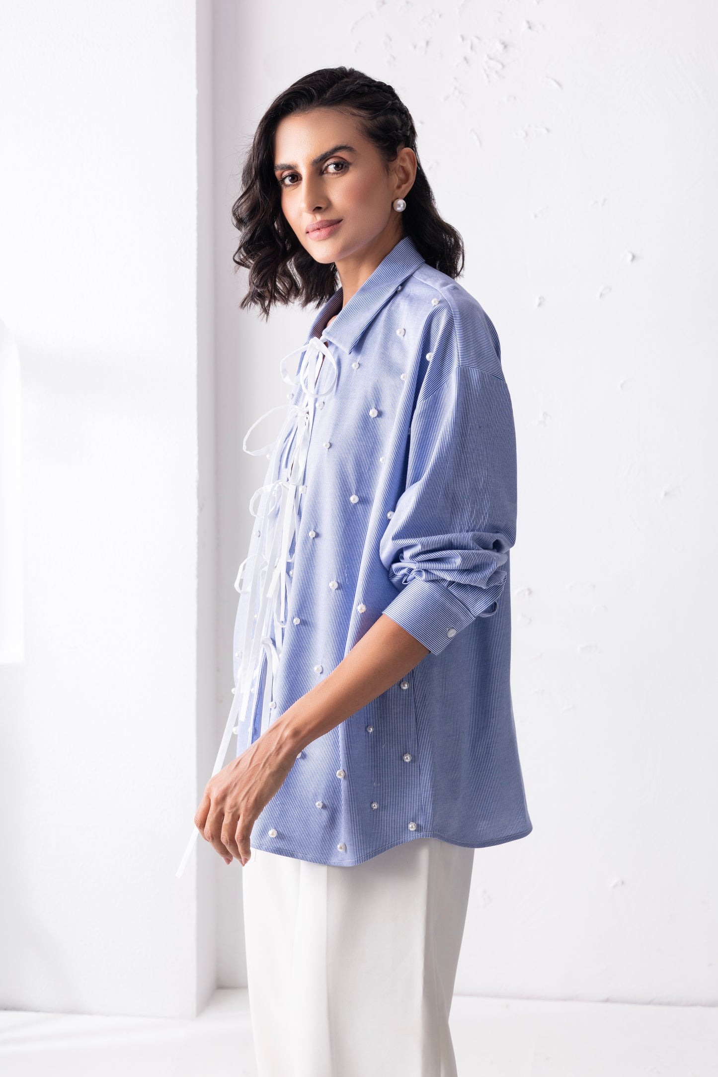 The blue tie-up pearl shirt