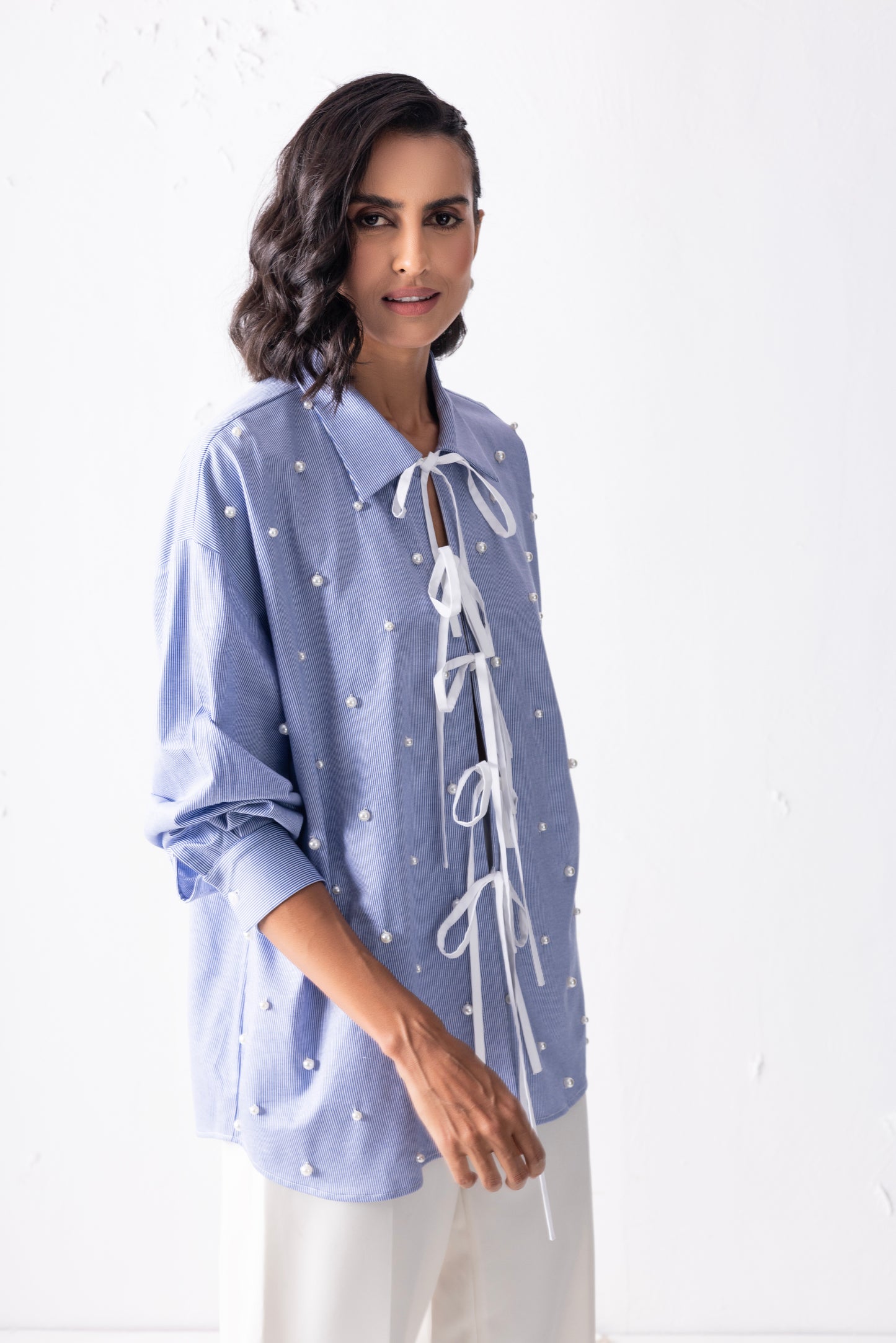The blue tie-up pearl shirt