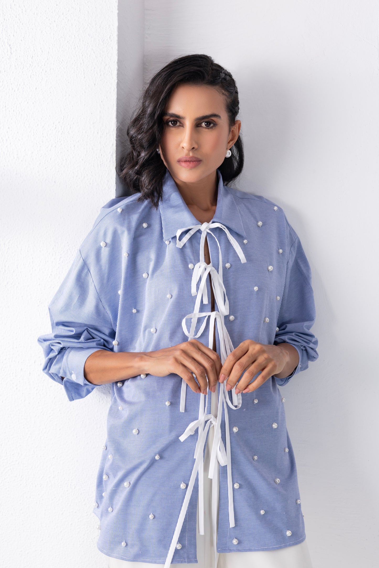 The blue tie-up pearl shirt
