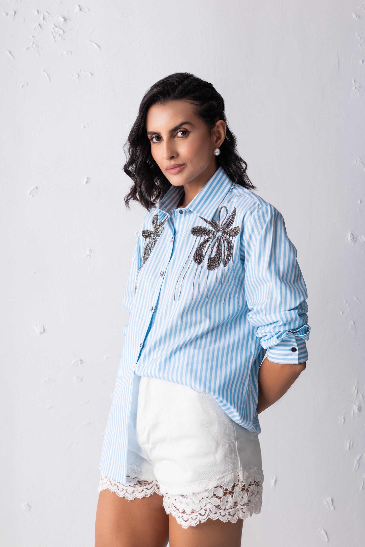 Striped shirt with floral embroidery