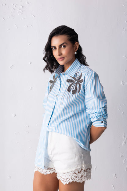 Striped shirt with floral embroidery